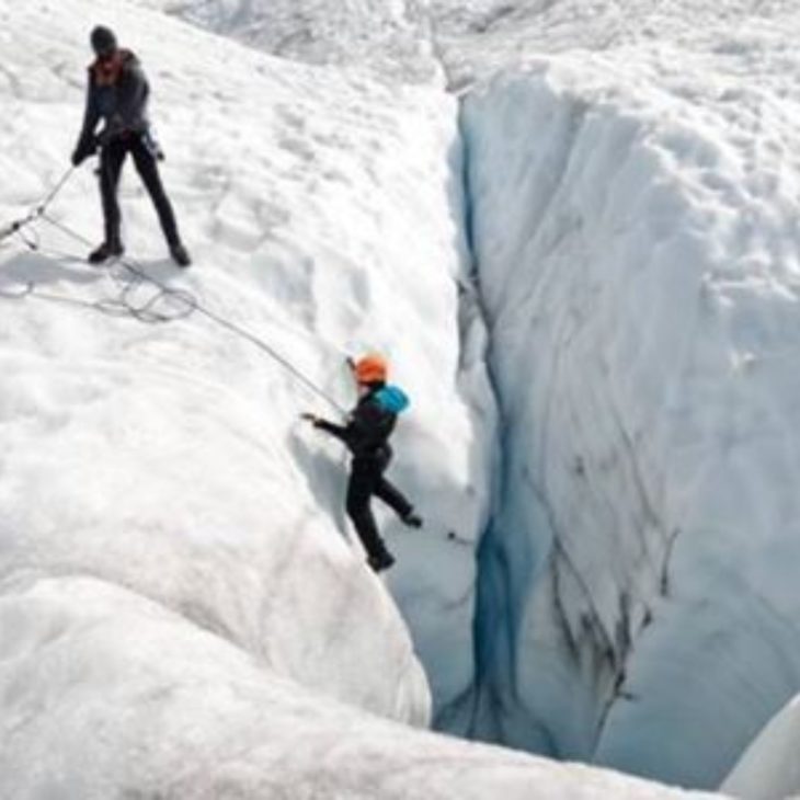 Glacier climbing during our alaska land tour packages