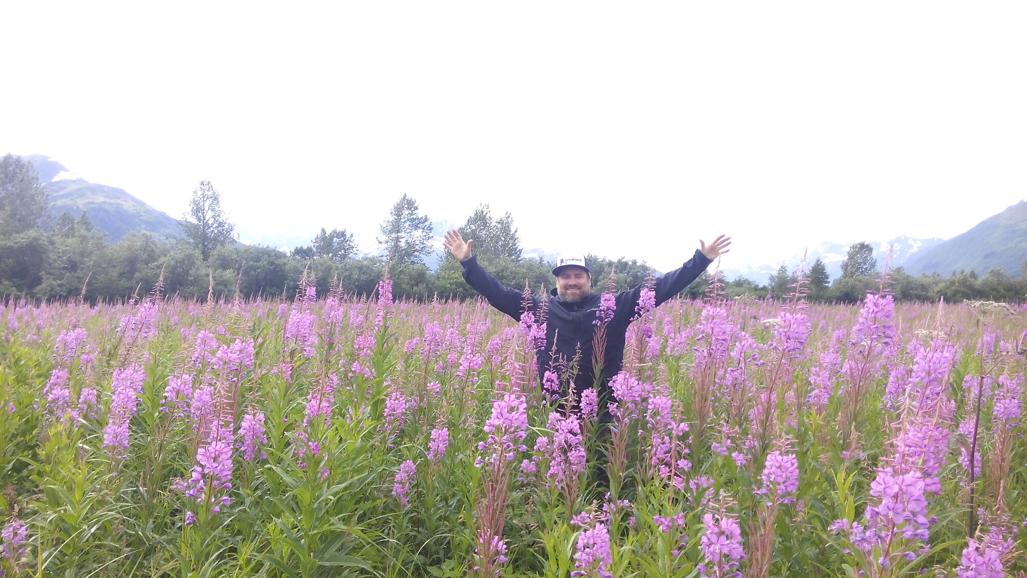 Hike Chugach State Park man in flowers