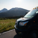 a tour van in an Alaskan landscape